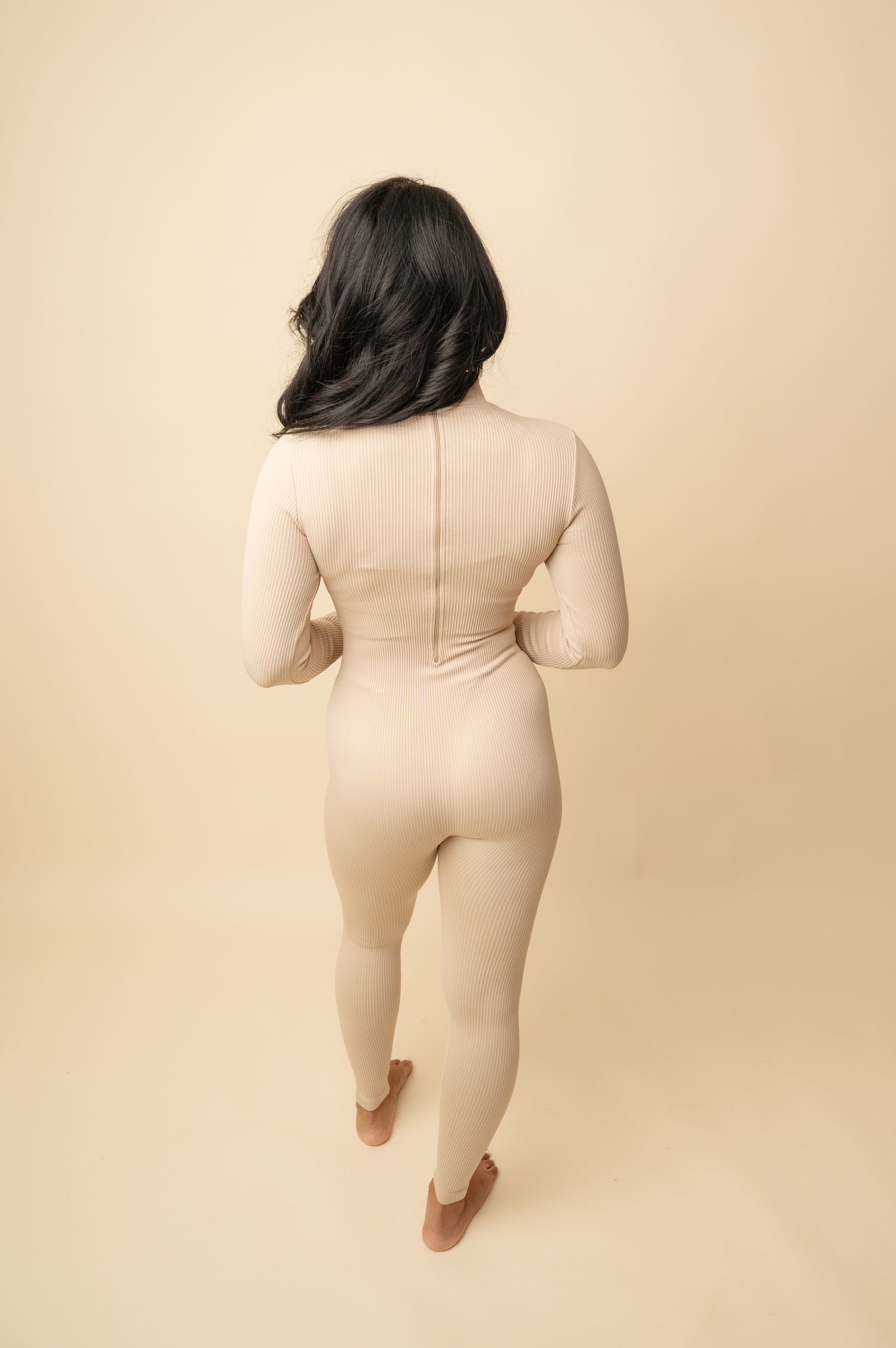 Sculpted Luxe Ribbed Jumpsuit
Available in Taupe & Beige